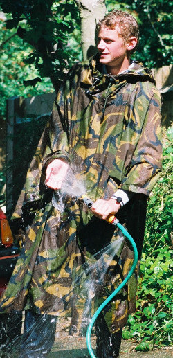 green camo rain poncho wet